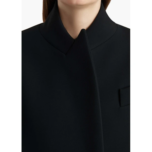 Elevate your elegance in this Khaite Coats   from the 2025 resort wear edit