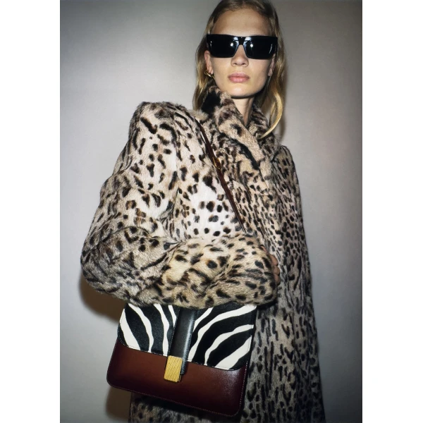 Elevate your elegance in this Khaite Coats   from the 2025 resort wear edit