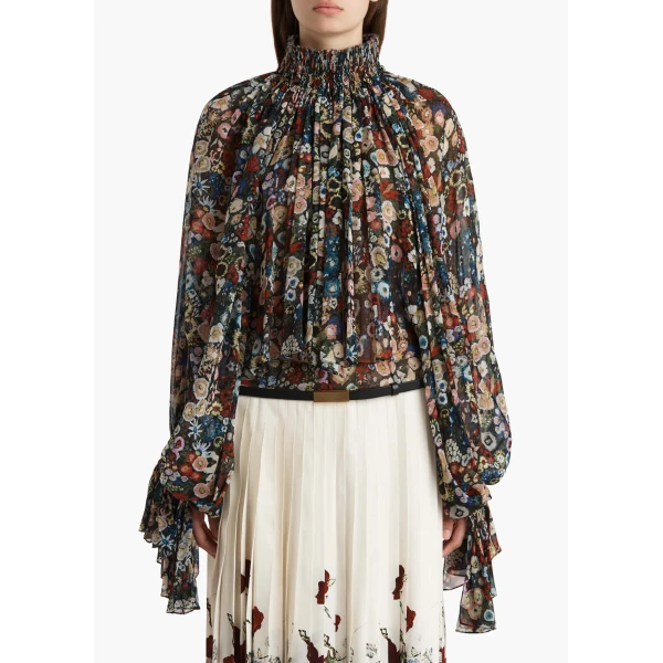 Elevate your elegance in this Khaite Tops   from the 2025 resort wear edit
