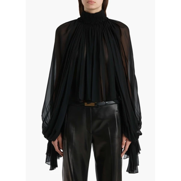Elevate your elegance in this Khaite Tops   from the 2025 resort wear edit