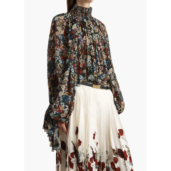 Elevate your elegance in this Khaite Tops   from the 2025 resort wear edit