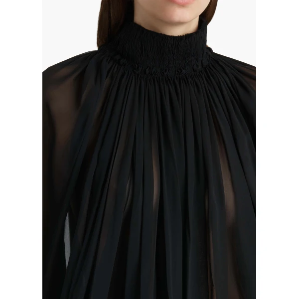 Elevate your elegance in this Khaite Tops   from the 2025 resort wear edit