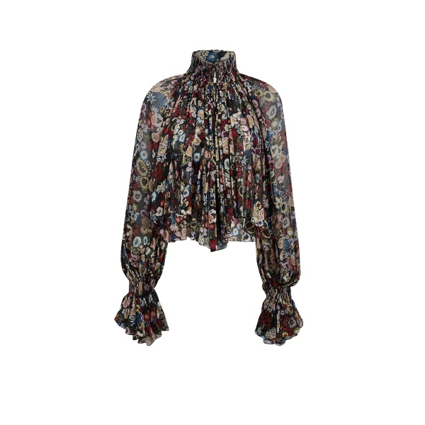 Elevate your elegance in this Khaite Tops   from the 2025 resort wear edit