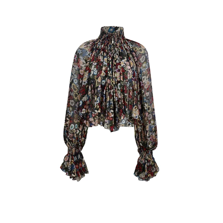 Elevate your elegance in this Khaite Tops   from the 2025 resort wear edit