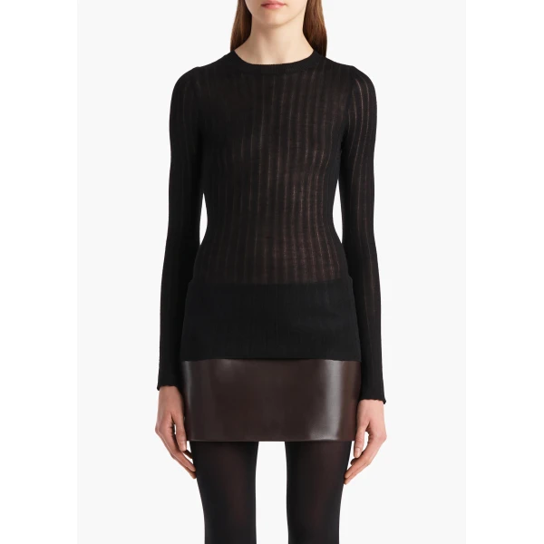 Elevate your elegance in this Khaite Tops   from the 2025 resort wear edit