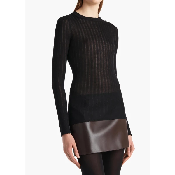 Elevate your elegance in this Khaite Tops   from the 2025 resort wear edit