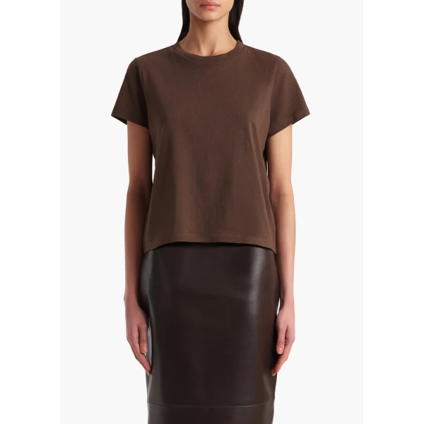 Elevate your elegance in this Khaite Tops   from the 2025 resort wear edit