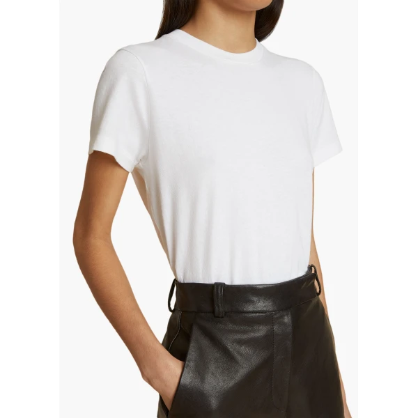 Elevate your elegance in this Khaite Tops   from the 2025 resort wear edit