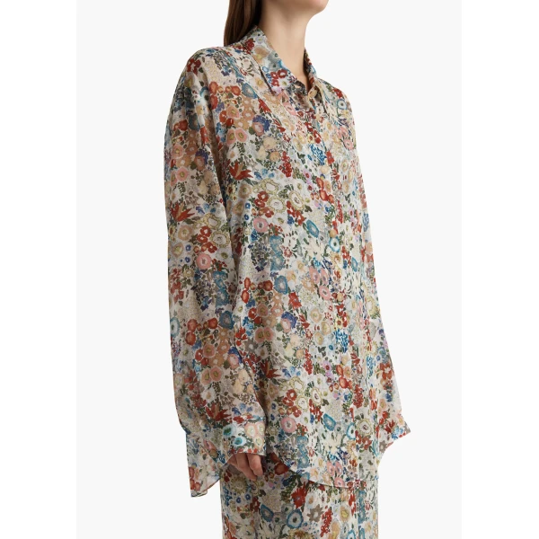 Elevate your elegance in this Khaite Tops   from the 2025 resort wear edit