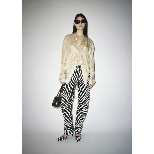 Elevate your elegance in this Khaite Tops   from the 2025 resort wear edit