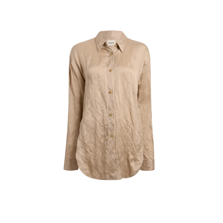 Elevate your elegance in this Khaite Tops   from the 2025 resort wear edit