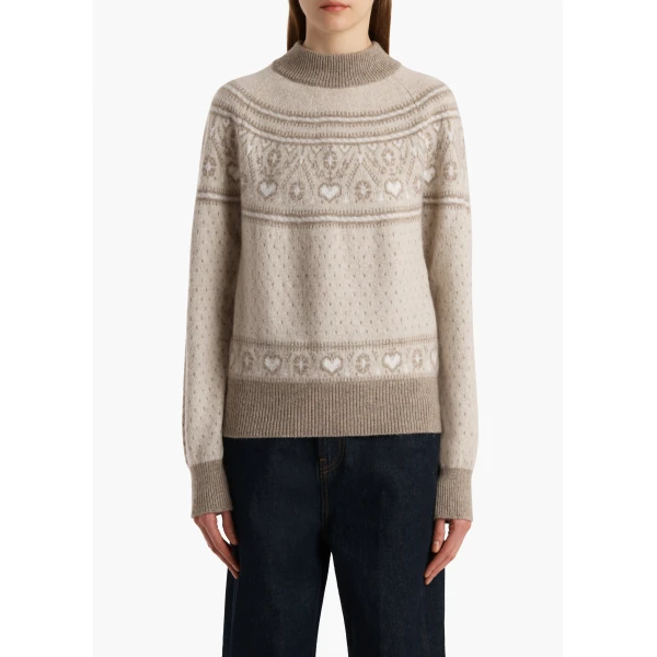 Elevate your elegance in this Khaite Knitwear   from the 2025 resort wear edit