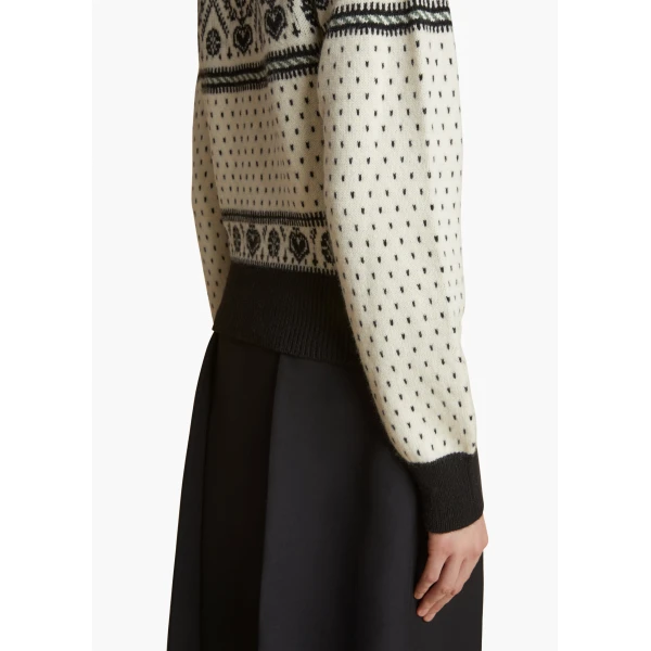 Elevate your elegance in this Khaite Knitwear   from the 2025 resort wear edit
