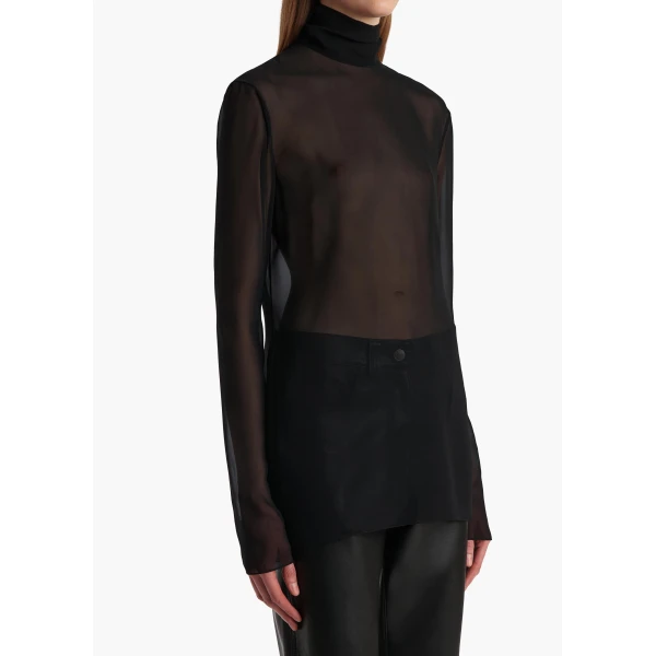Elevate your elegance in this Khaite Tops   from the 2025 resort wear edit
