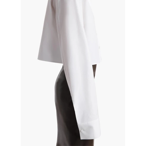 Elevate your elegance in this Khaite Tops   from the 2025 resort wear edit