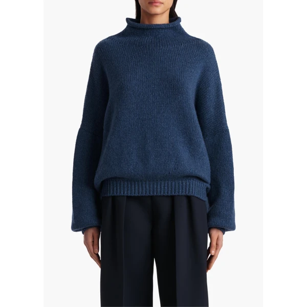 Elevate your elegance in this Khaite Knitwear   from the 2025 resort wear edit