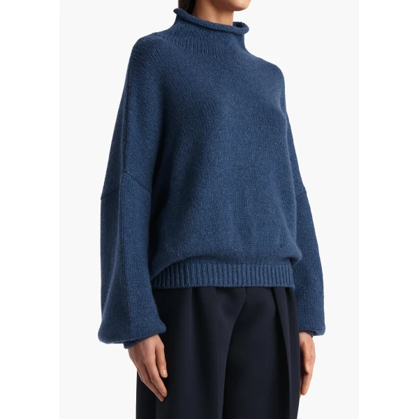 Elevate your elegance in this Khaite Knitwear   from the 2025 resort wear edit