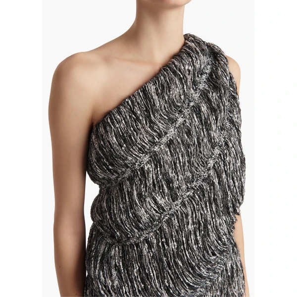 Elevate your elegance in this Khaite Tops   from the 2025 resort wear edit