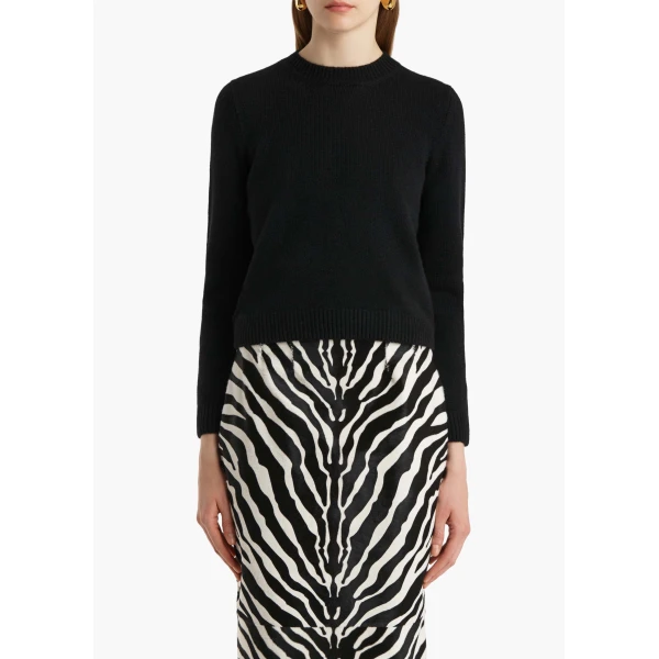 Elevate your elegance in this Khaite Knitwear   from the 2025 resort wear edit