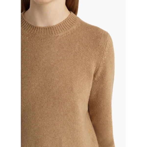 Elevate your elegance in this Khaite Knitwear   from the 2025 resort wear edit