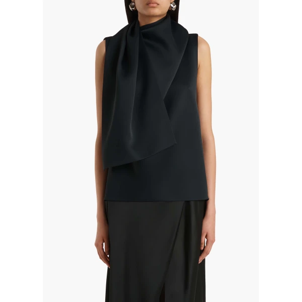 Elevate your elegance in this Khaite Tops   from the 2025 resort wear edit