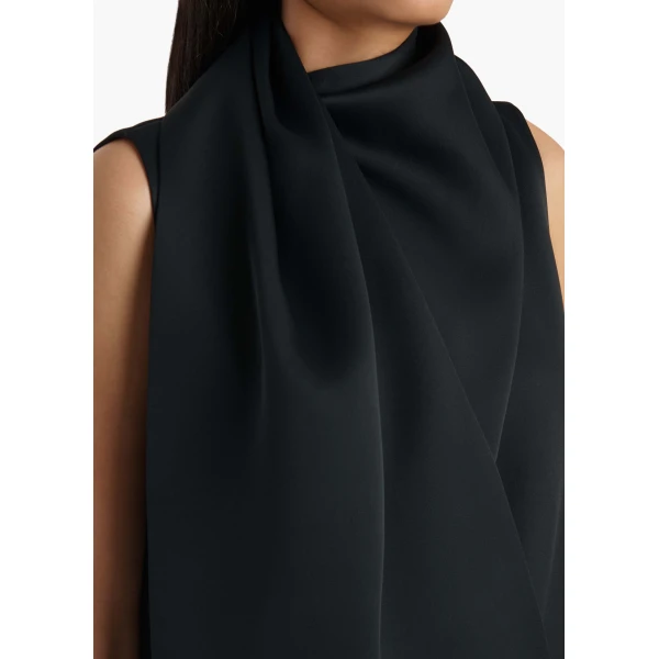 Elevate your elegance in this Khaite Tops   from the 2025 resort wear edit