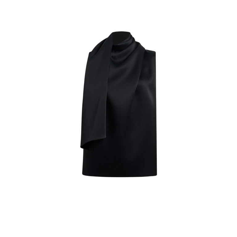 Elevate your elegance in this Khaite Tops   from the 2025 resort wear edit