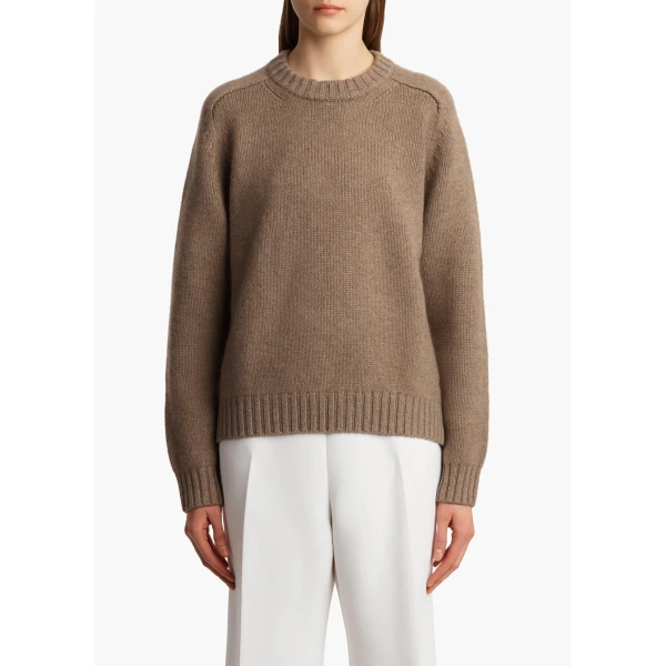 Elevate your elegance in this Khaite Knitwear   from the 2025 resort wear edit