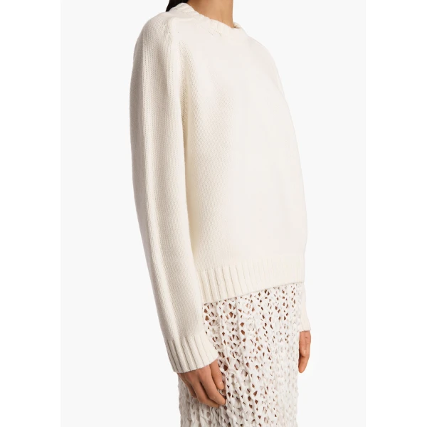 Elevate your elegance in this Khaite Knitwear   from the 2025 resort wear edit