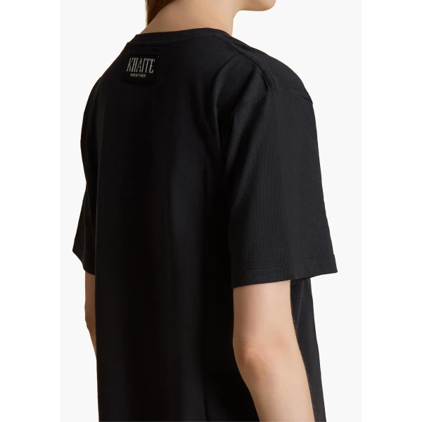 Elevate your elegance in this Khaite Tops   from the 2025 resort wear edit