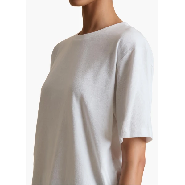 Elevate your elegance in this Khaite Tops   from the 2025 resort wear edit