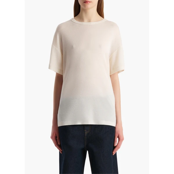 Elevate your elegance in this Khaite Tops   from the 2025 resort wear edit