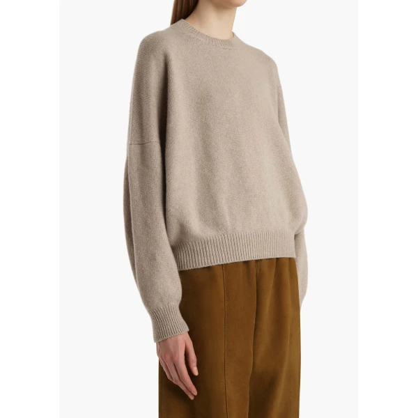 Elevate your elegance in this Khaite Knitwear   from the 2025 resort wear edit
