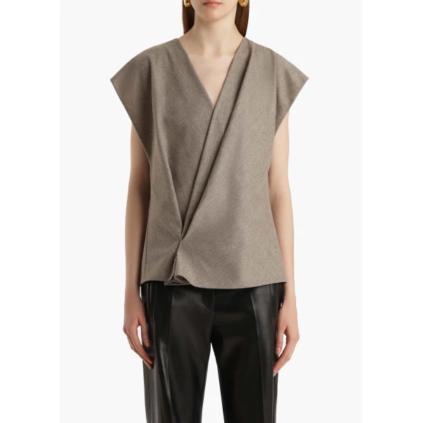 Elevate your elegance in this Khaite Tops   from the 2025 resort wear edit