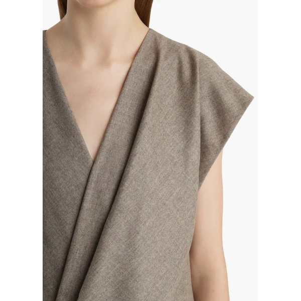 Elevate your elegance in this Khaite Tops   from the 2025 resort wear edit