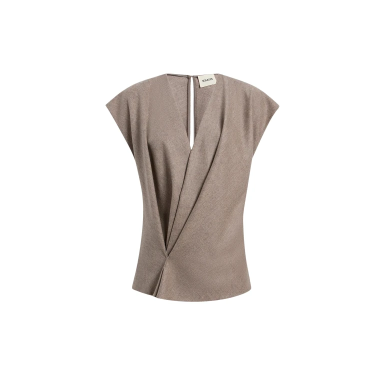 Elevate your elegance in this Khaite Tops   from the 2025 resort wear edit
