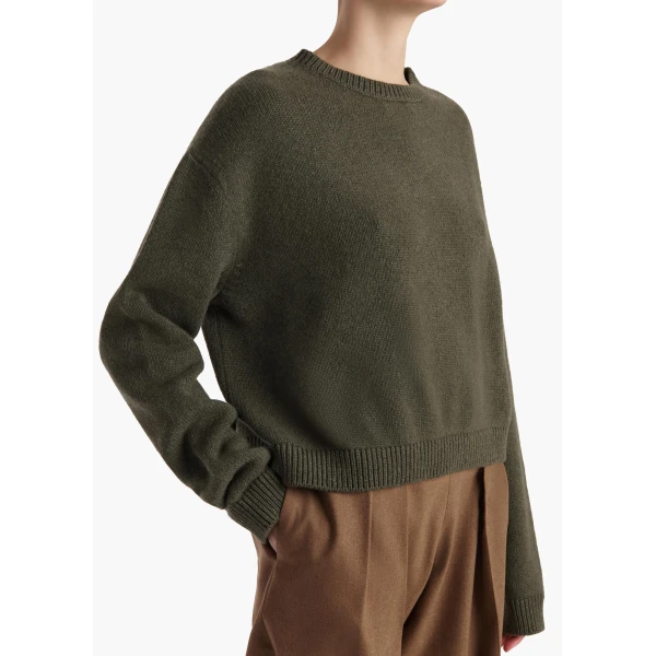 Elevate your elegance in this Khaite Knitwear   from the 2025 resort wear edit