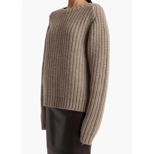 Elevate your elegance in this Khaite Knitwear   from the 2025 resort wear edit