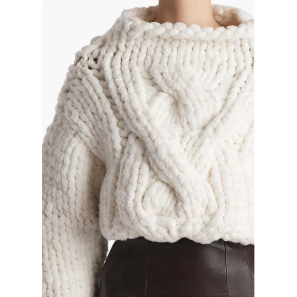 Elevate your elegance in this Khaite Knitwear   from the 2025 resort wear edit