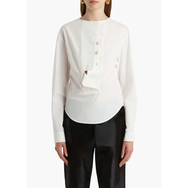 Elevate your elegance in this Khaite Tops   from the 2025 resort wear edit