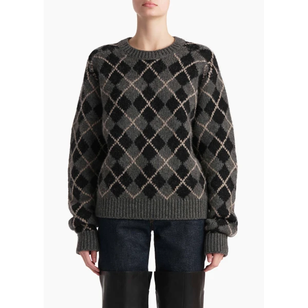 Elevate your elegance in this Khaite Knitwear   from the 2025 resort wear edit