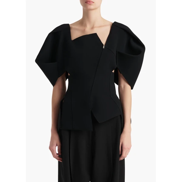 Elevate your elegance in this Khaite Tops   from the 2025 resort wear edit