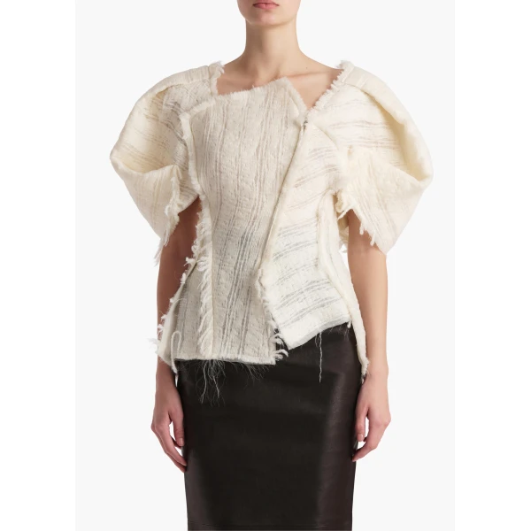 Elevate your elegance in this Khaite Tops   from the 2025 resort wear edit