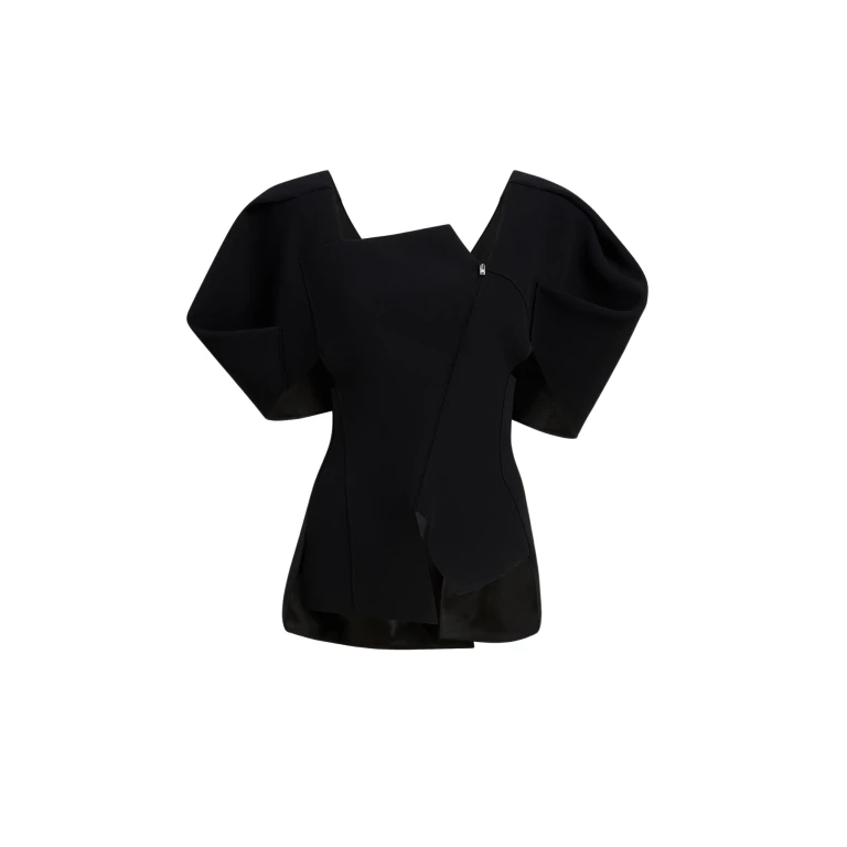 Elevate your elegance in this Khaite Tops   from the 2025 resort wear edit