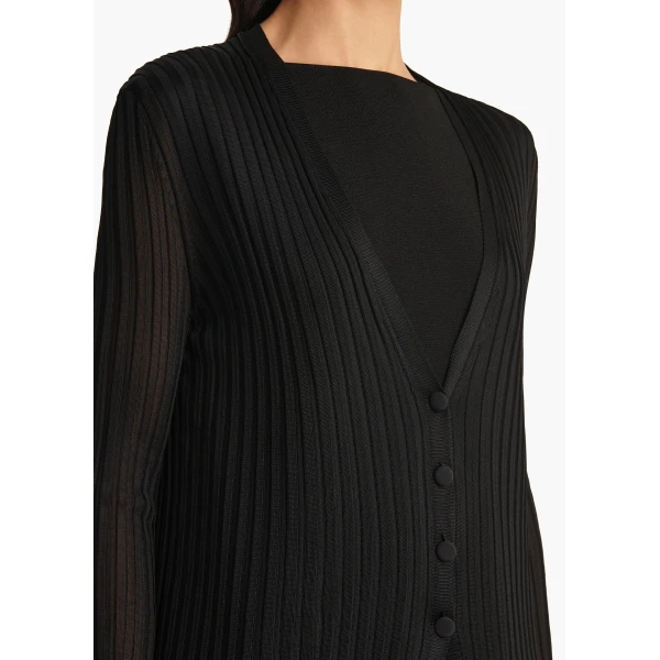 Elevate your elegance in this Khaite Knitwear   from the 2025 resort wear edit