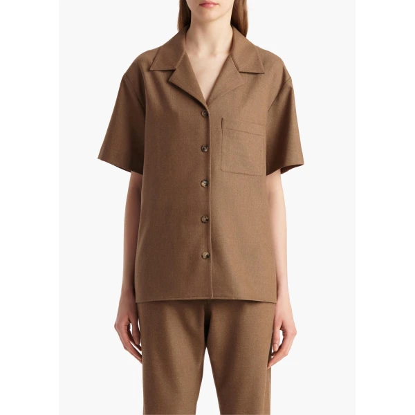Elevate your elegance in this Khaite Tops   from the 2025 resort wear edit