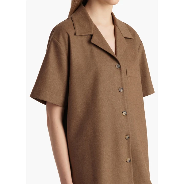 Elevate your elegance in this Khaite Tops   from the 2025 resort wear edit