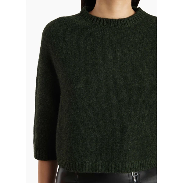 Elevate your elegance in this Khaite Knitwear   from the 2025 resort wear edit
