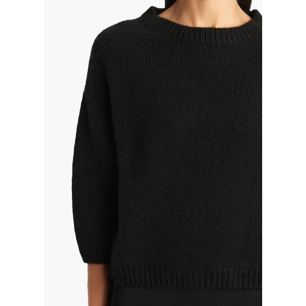 Elevate your elegance in this Khaite Knitwear   from the 2025 resort wear edit