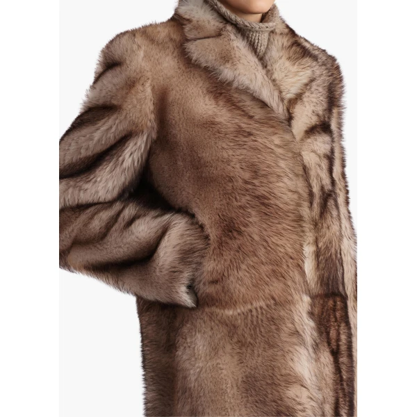 Elevate your elegance in this Khaite Coats   from the 2025 resort wear edit